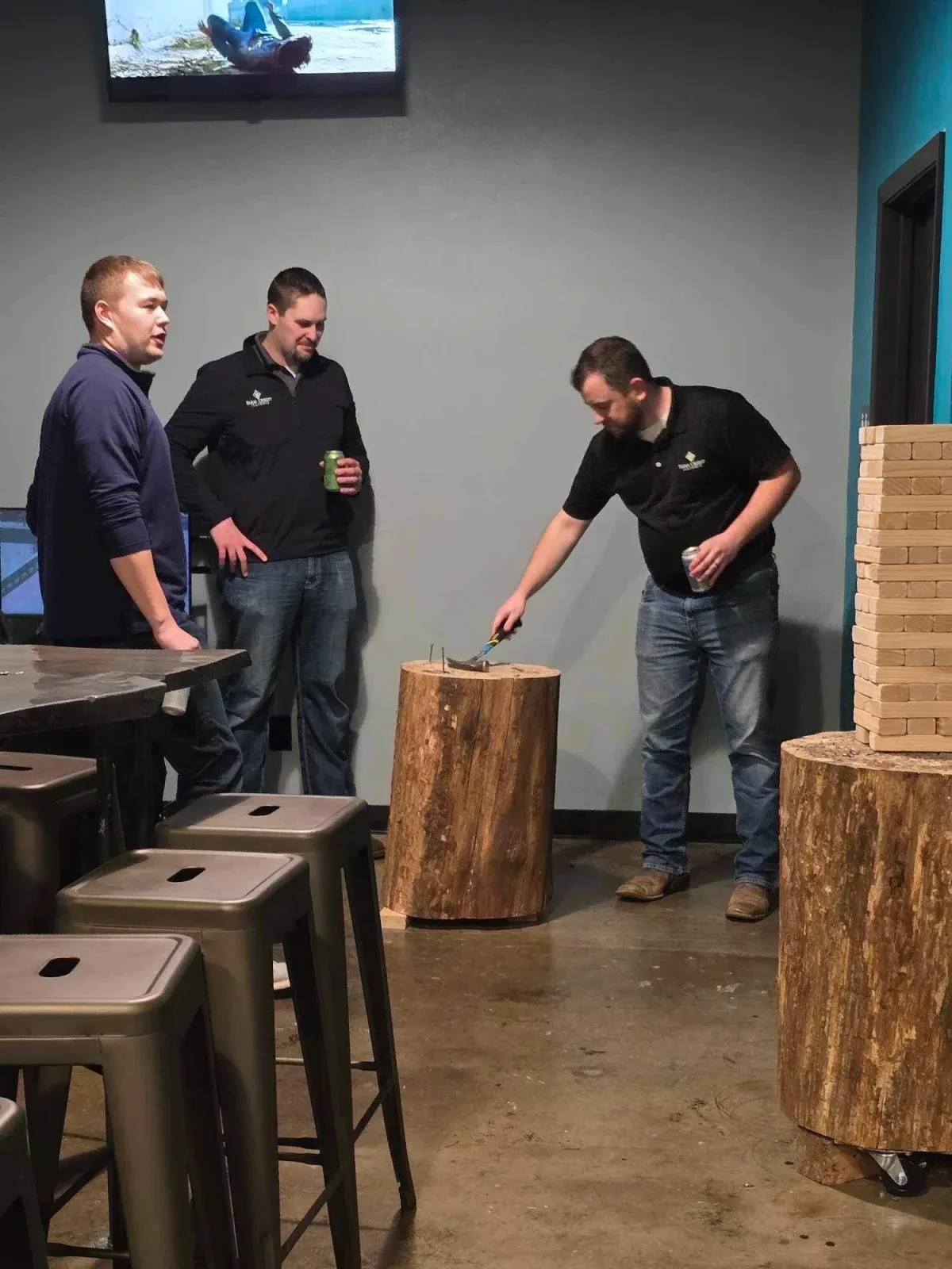 Guests with drinks playing Stumped